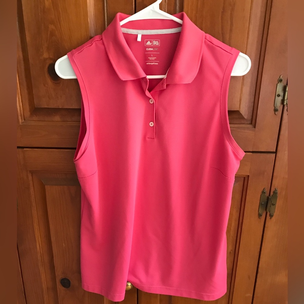 Sleeveless golf or tennis top